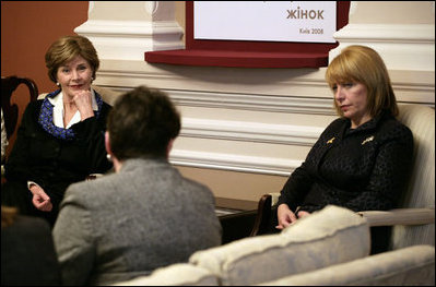 Mrs. Laura Bush and Mrs. Kateryna Yushchenko, wife of Ukraine President Viktor Yushchenko, participate in a tea with breast cancer advocates and survivors Tuesday, April 1, 2008, at the Diplomatic Academy in Kyiv.