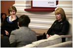 Mrs. Laura Bush and Mrs. Kateryna Yushchenko, wife of Ukraine President Viktor Yushchenko, participate in a tea with breast cancer advocates and survivors Tuesday, April 1, 2008, at the Diplomatic Academy in Kyiv.