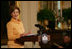 Mrs. Laura Bush welcomes guests to the East Room of the White House Monday, May 12, 2008, as she congratulates the recipients of the 2008 Preserve America Presidential Awards. The African Burial Ground Project, The Corinth and Alcorn County Mississippi Heritage Tourism Initiative, the Lower East Side Tenement Museum and the Texas Historic Courthouse Preservation Program were all honored for their efforts in preserving our national historic sites.