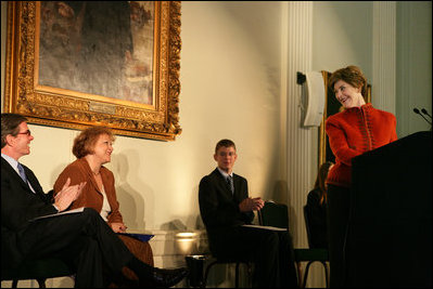 Mrs. Laura Bush smiles at Gerry Kohler, recipient of the 2006 Preserve America History Teacher of the Year award, while delivering remarks during a ceremony at the Union League Club in New York City, Thursday, October 5, 2006. Mrs. Kohler is a teacher at VanDevender Junior High School in West Virginia. Also shown are Dr. James Basker, President, Gilder Lehrman Institute of American History, left, and Patrick Shahan and Elizabeth Corbit, students of Mrs. Kohler’s. White House photo by Shealah Craighead 