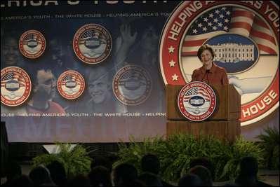 Mrs. Laura Bush speaks during a conference on Helping America's Youth Thursday, Nov. 8, 2007, at Dallas Baptist University in Dallas. "To make sure every child is surrounded by these positive influences, even more adults must dedicate themselves to helping young people," said Mrs. Bush. "Adults should be aware of the challenges facing children, and then they should take an active interest in children's lives. Adults, and especially parents, should build relationships where they teach their children healthy behaviors by their own good example."