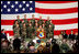 Mrs. Laura Bush addresses an audience of U.S.troops during a visit to Aviano Air Base, in Aviano, Italy, Friday, Feb. 10, 2006. White House photo by Shealah Craighead 