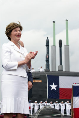 Mrs. Laura Bush, ship sponsor of the USS Texas, applauds at the conclusion of the Commissioning Ceremony Saturday, September 9, 2006, in Galveston, Texas. White House photo by Shealah Craighead 