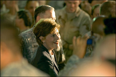 Mrs. Laura Bush meets troops after addressing them Thursday, Oct. 25, 2007, at Ali Al Salem Air Base near Kuwait City. Mrs. Bush told her audience, "Ali Al Salem is the first base where American and Kuwaiti flags were flown together. This is the perfect place to recognize the friendship between Kuwait and the United States -- and to thank all of the Kuwaitis who support our American Armed Forces."