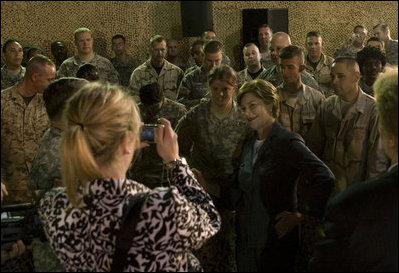 Mrs. Laura Bush poses for pictures after addressing American troops Thursday, Oct. 25, 2007, at Ali Al Salem Air Base, Kuwait. It is the third country visited by the First Lady on her four-country, Mideast tour.