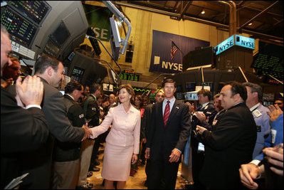 Mrs. Laura Bush is greeted on the floor of the New York Stock Exchange Monday, Sept. 18, 2006. Mrs. Bush visited the exchange with a delegation of entrepreneurs from around the world to participate in the close of trading and to ring the Closing Bell. White House photo by Shealah Craighead 