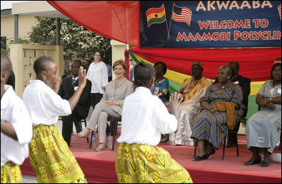 Mrs. Laura Bush watches a children's dance performance during welcome ceremonies Wednesday, Feb. 20, 2008, at the Maamobi Polyclinic health facility in Accra, Ghana.