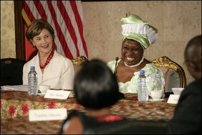 Mrs. Laura Bush participates in a roundtable discussion Thursday, February 21, 2008, in Monrovia, Liberia, with Karyumu Boakai, Spouse of Vice President Joseph Boakai, and local adults who have been faced with and persevered in working with Liberian youth who have been affected by the war.