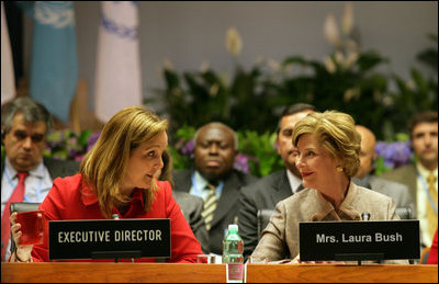 Mrs. Laura Bush talks with World Food Program Executive Director Josette Sheeran during the plenary session at the WFP conference Thursday, June 12, 2008, in Rome.