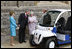 Her Majesty Queen Elizabeth II and High Highness Prince Philip, Duke of Edinburgh, enjoy the gift presented by President George W. Bush and Mrs. Laura Bush of a GEM car for the Queen. The presentation was made June 15, 2008 during the Bush's visit to Windsor Castle in Windsor, England.