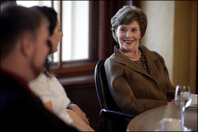 Mrs. Laura Bush smiles as she listens to a participant Wednesday, June 6, 2007, during a roundtable discussion with Fulbright Scholars at the Schwerin Castle in Schwerin, Germany.