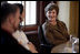 Mrs. Laura Bush smiles as she listens to a participant Wednesday, June 6, 2007, during a roundtable discussion with Fulbright Scholars at the Schwerin Castle in Schwerin, Germany.