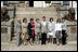 Partners of the G8 leaders pose outside Burg Schlitz Thursday, June 7, 2007, in Hohen Demzin, Germany. From left are: Mrs. Laureen Harper, Mrs. Lyudmila Putina, Mrs. Flavia Franzoni, Mrs. Laura Bush, Dr. Joachim Sauer, Mrs. Cherie Booth Blair, Mrs. Maria Margarida Pinto Ribeiro Sousan Uva Barroso and Mrs. Akie Abe.