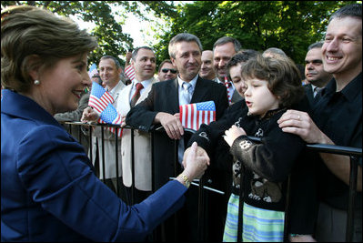 Mrs. Laura Bush is greeted by well-wishers Monday, June 11, 2007, during arrival ceremonies in Sofia's Nevsky Square. The Bulgaria stop was the last on a weeklong, six-country European visit by the President and Mrs. Bush.