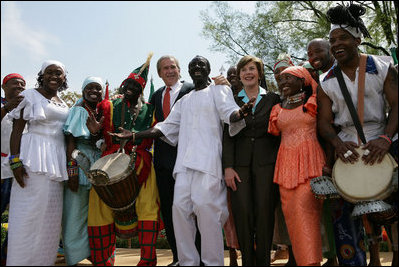 President George W. Bush and Mrs. Laura Bush stands with the Kankouran West African Dance Company after delivering remarks during a ceremony marking Malaria Awareness Day Wednesday, April 25, 2007, in the Rose Garden. "The American people, through their government, are working to end this epidemic,"said President Bush. "In 2005, President Bush announced the President's Malaria Initiative -- a five-year, $1.2 billion program to combat malaria in the hardest-hit African nations."
