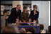 Mrs. Laura Bush participates in a ribbon-cutting Wednesday, June 6, 2007, at the Schwerin City Library in Schwerin, Germany. Joining her are Norbert Claussen, Lord Mayor of Schwerin, and Heidrun Hamann, the Director of the library.