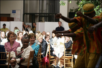Mrs. Laura Bush listens to the African Children's Choir during a luncheon on global health and literacy Tuesday, Sept. 24, 2007, at the Pierpont Morgan Library in New York.