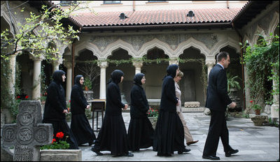 Mrs. Laura Bush and Sisters of the Stavropoleos Monastery in Bucharest, follow Dr. Petre Radu Guran as he leads them across the church courtyard Friday, April 4, 2008. In 2003, the U.S. Embassy donated $27,000 for the restoration of the courtyard under the auspices of a special U.S. Department of State program entitled, “Ambassador’s Fund for Cultural Preservation.