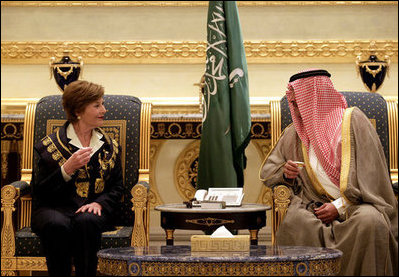 After arriving in Riyadh, Tuesday, Oct. 23, 2007, Mrs. Laura Bush talks with Prince Faisal Bin Abdallah Bin Abd al-Aziz Al Saud, President of the Saudi Cancer Society and President of the Saudi Red Crescent Society.