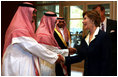 Mrs. Laura Bush is greeted by Mr. Bade Al-Romaih, Guest Relations Manager for the Conference Palace Hotel, upon her arrival for a private lunch Tuesday, Oct. 23, 2007, in Riyadh, Saudi Arabia.