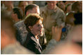 Mrs. Laura Bush meets troops after addressing them Thursday, Oct. 25, 2007, at Ali Al Salem Air Base near Kuwait City. Mrs. Bush told her audience, "Ali Al Salem is the first base where American and Kuwaiti flags were flown together. This is the perfect place to recognize the friendship between Kuwait and the United States -- and to thank all of the Kuwaitis who support our American Armed Forces."
