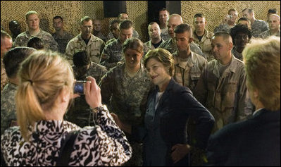 Mrs. Laura Bush poses for pictures after addressing American troops Thursday, Oct. 25, 2007, at Ali Al Salem Air Base, Kuwait. It is the third country visited by the First Lady on her four-country, Mideast tour.