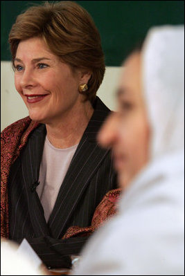 Laura Bush listens to Afghan teachers and students at the Women’s Teacher’s Training Institute of Kabul University in Kabul, Afghanistan, Wednesday, March 30, 2005. 