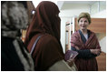 Laura Bush talks with female students in the newly built National Women’s Dormitory on the campus of Kabul University Wednesday, March 30, 2005, in Kabul, Afghanistan. The women’s dormitory was built to provide a safe place for young women to live while pursuing studies away from their families. 