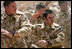 New Zealand soldiers perform a traditional warrior's dance Sunday, June 8, 2008, during a welcoming ceremony for Mrs. Laura Bush at the Bamiyan Provincial Reconstruction Team Base in Afghanistan's Bamiyan province.