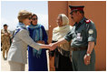 Governor Habiba Sarabi, center, introduces Mrs. Laura Bush to Col. Hafizullah Paymon, Commander of the Afghan Regional Training Center, during a visit to the Police Training Academy in Bamiyan, Afghanistan there Sunday, June 8, 2008.