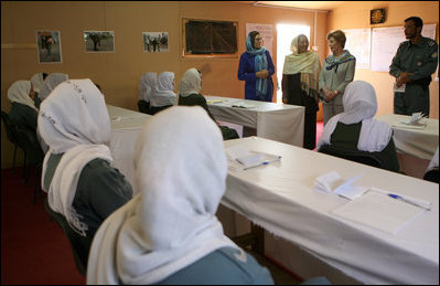 Mrs. Laura Bush and Governor Habiba Sarabi, in white, meet with female police trainees who will graduate June 15th from Non-Commissioned Officer Training during a visit Sunday, June 8, 2008, to the Police Training Academy in Bamiyan, Afghanistan.