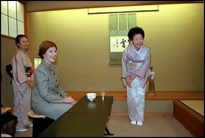 Mrs. Bush and hostess Kiyoko Fukuda, right, share a light moment at the conclusion of a tea ceremony held at Akasaka Palace Monday, February 18, 2002.