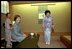 Mrs. Bush and hostess Kiyoko Fukuda, right, share a light moment at the conclusion of a tea ceremony held at Akasaka Palace Monday, February 18, 2002.