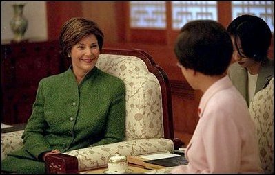 Mrs. Bush talks with Madame Lee Hee-ho, First Lady of the Republic of Korea, during a tea at Chong Wa Dae (The Blue House) Wednesday, February 20, 2002 in Seoul, Korea.