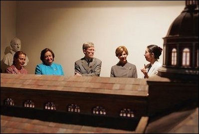 Laura Bush tours "Recoleta Dominica" convent library and religious museum with leaders' spouses including, from left, Ms. Elaine Karp of Peru, Mrs. Luisa Duran de Lagos of Chile, and Mr. Peter Davis of New Zealand in Santiago, Chile, Nov. 20, 2004. Founded in 1753, the convent and monastery has served as a religious home, a school and now is being restored as a museum.