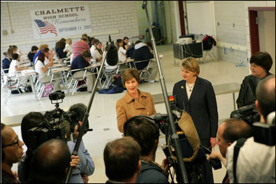 Laura Bush and U.S. Secretary of Education Margaret Spellings talk with reporters following their visit with staff and students Wednesday, Jan. 26, 2006 at the St. Bernard Unified School in Chalmette, La. The school is rebuilding after being ravaged in Hurricane Katrina.