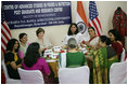 Mrs. Laura Bush visits with teachers and students at a Home Science School Lab, Friday, March 3, 2006, during a women empowerment meeting at the Acharya N.G. Ranga Agricultural University in Hyderabad, India.