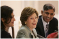 Mrs. Laura Bush addresses a roundtable discussion during an Education Through Partnerships meeting with representatives from USAID, UNESCO & CRI at library at the U.S. Embassy, Saturday, March 4, 2006 in Islamabad, Pakistan.