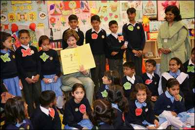 Mrs. Laura Bush reads to children at the Children's Resources International clasroom at the U.S. Embassy, Saturday, March 4, 2006 in Islamabad, Pakistan.