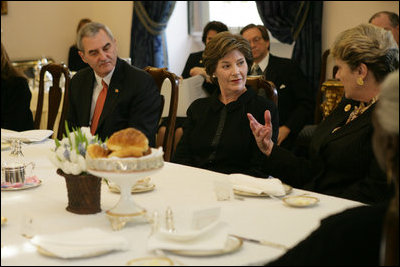Mrs. Laura Bush listens as she participates in a briefing presented by the USUN Mission and World Food Program, Thursday, Feb. 9, 2006 in Rome, regarding hunger and AIDS issues. One of the purposes of the U.S. Mission to the UN agencies for Food and Agriculture is to draw attention to the global problems of hunger and food security. Ambassador Ronald Spogli, U.S. Ambassador to Italy, is seen at left.