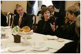 Mrs. Laura Bush listens as she participates in a briefing presented by the USUN Mission and World Food Program, Thursday, Feb. 9, 2006 in Rome, regarding hunger and AIDS issues. One of the purposes of the U.S. Mission to the UN agencies for Food and Agriculture is to draw attention to the global problems of hunger and food security. Ambassador Ronald Spogli, U.S. Ambassador to Italy, is seen at left.