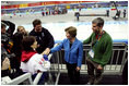 Laura Bush and former Olympian Dr. Eric Heiden meets with the family and parents of US speed skater Chad Hedrick after Hedrick finished first place in his heat taking the first US gold medal in the 2006 Winter Olympics in Turin, Italy.