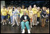 "Operation Compassion" volunteers wave to First Lady Laura Bush Monday, Sept. 19, 2005, as she visited Houston's George R. Brown Convention Center. The Convention Center was designated a shelter for Hurricane Katrina evacuees and since opening its doors Sept. 2, more than 35,000 have been served and approximately 46,000 volunteers have been trained.