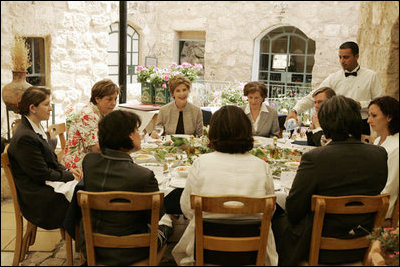 Laura Bush discusses the role of women in Jordan’s reform movement with Jordanian women leaders during lunch at the Haret Jdouna restaurant in Medaba, Jordan, Saturday, May 21, 2005.