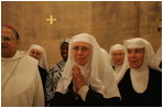 Benedictine nuns of the Church of the Resurrection at Abu Ghosh sing Psalm 150 in Hebrew during Laura Bush’s tour of monastery in Abu Ghosh Israel, Monday, May 23, 2005.