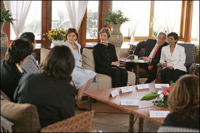 Laura Bush talks with Palestinian women about women's rights at the Jericho Intercontinental Hotel in Jericho, Sunday, May 22, 2005.