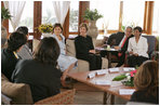 Laura Bush talks with Palestinian women about women’s rights at the Jericho Intercontinental Hotel in Jericho, Sunday, May 22, 2005.