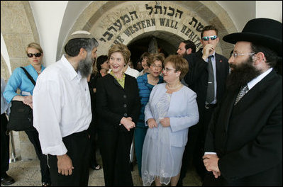 Laura Bush tours the Western Wall in Jerusalem with Rabbi Shmuel Rabinowitz, administrator of The Western Wall Heritage Foundation, Mosche Katsav, wife of Israeli President Moshe Katsav, center, and Mordechai “Suli” Eliav, manager of The Western Wall Heritage Foundation, May 22, 2005. The wall is a symbol of both Jewish worship and mourning for the Temple Mount, which was ordered constructed by King Herod the Great in 1500 A.D.