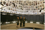 Laura Bush tours the Hall of Names with Gila Katsav, wife of President Moshe Katsav of Israel, left, and General Avner Shalev, chairman of the Yad Vashem Directorate, right, at the Yad Vashem Holocaust museum in Jerusalem, Sunday, May 22, 2005. The Hall of Names is a repository of testimony from millions of Holocaust victims and serves as a memorial to those who died.