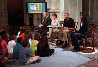Librarian of Congress, James Billington, Mrs. Bush, Orlando Magic Grant Hill and LA Sparks Lisa Leslie participate in the National Book Festival Back to School event in the Great Hall at the Library of Congress Jefferson Building Sept. 7, 2001 in Washington, D.C.